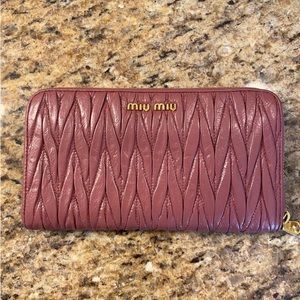 Long Zippy Miu Miu Wallet mauve colors.  Beautiful